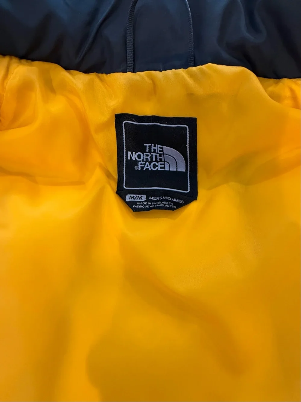 The North Face Men’s Down Vest in Charcoal with Yellow Trim (Medium)
